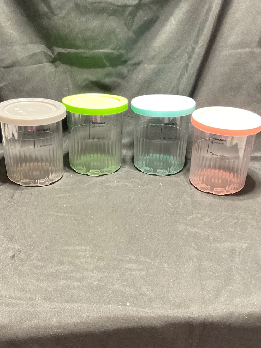 Set of 4 Ninja Creami Ice Cream maker Containers.